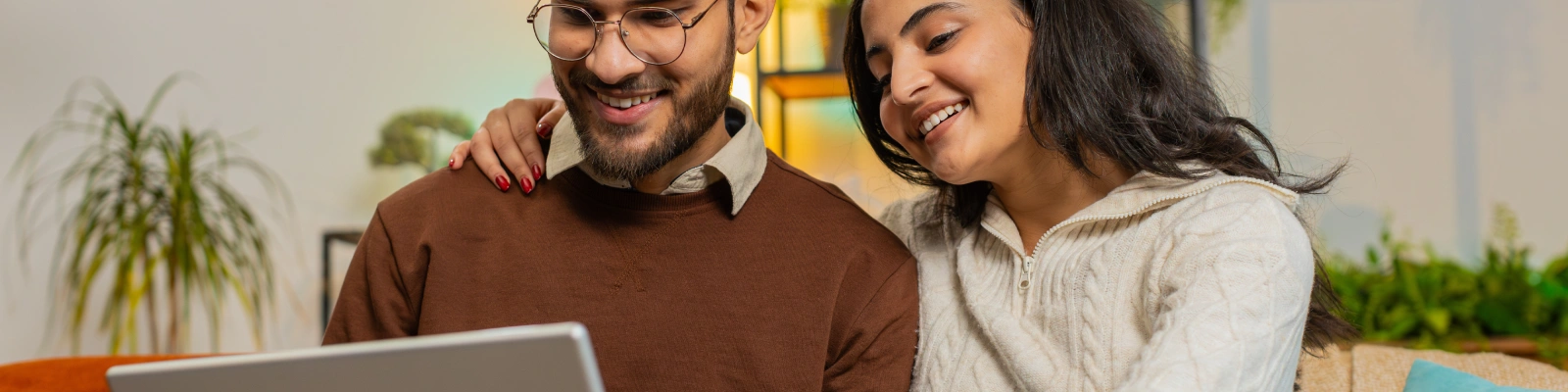 couple using a laptop